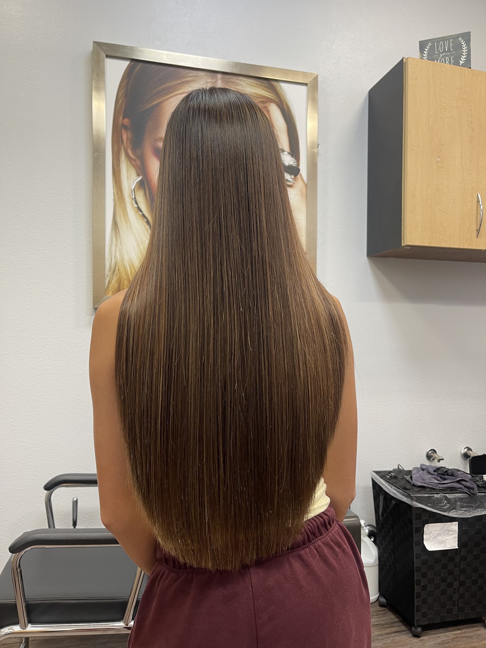 Long, healthy glossy hair styled by Tracy